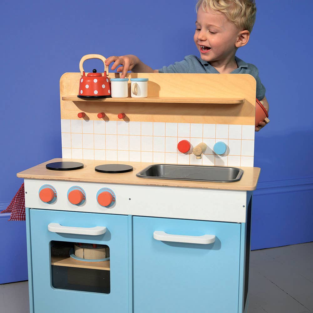 Wooden Role Play Kitchen - Mentari Toys in pastel blue with stove, sink, and accessories for kids aged 3+. Ideal for pretend cooking and role play fun.
