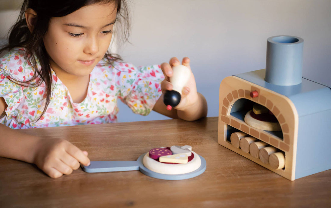 Make Me a Pizza! - Wooden Pizza Oven Toy Play Set with oven, toppings, paddle, and pepper grinder for pretend play kitchens. Ideal for kids age 3+.