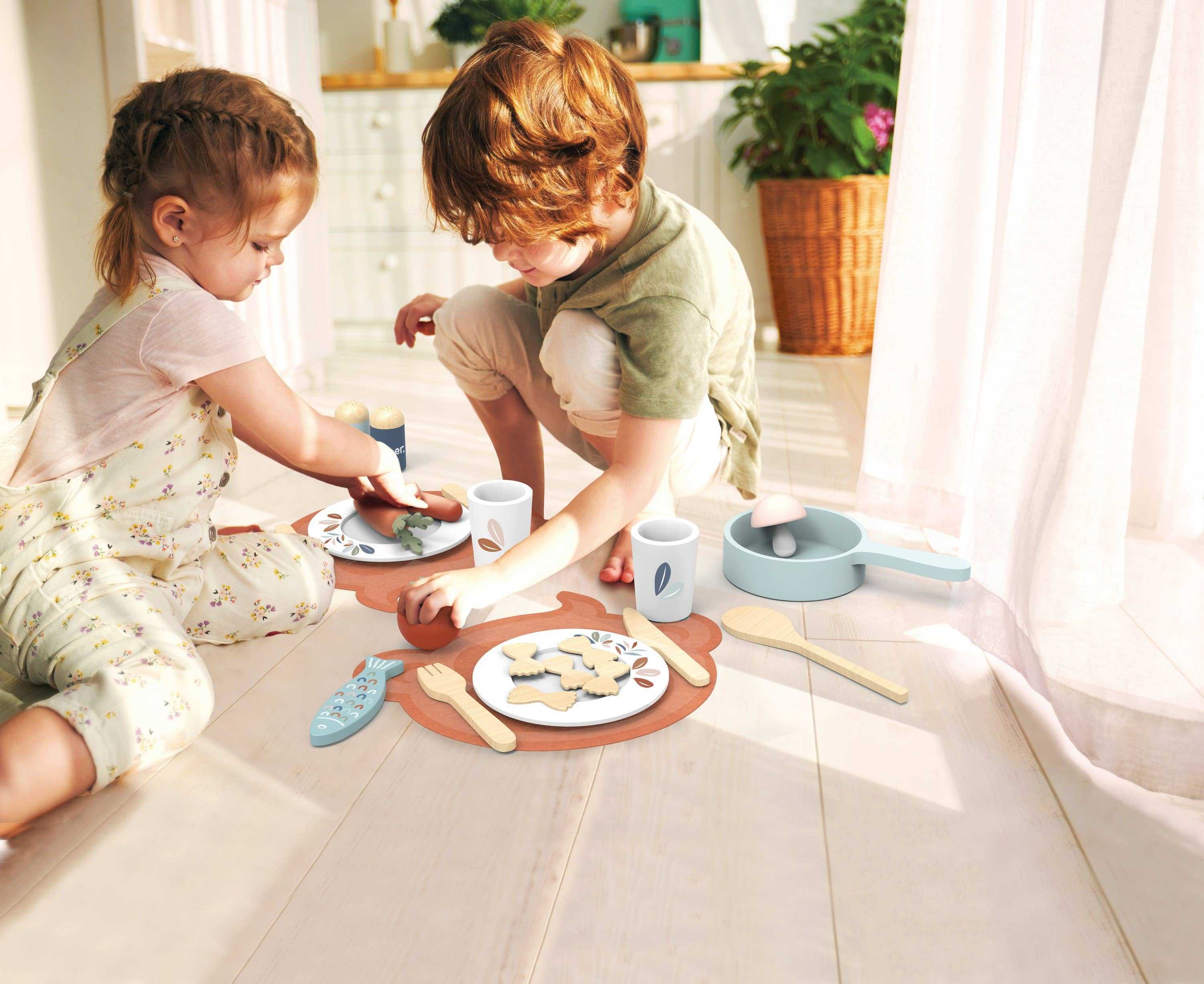 Children role-playing with the Wooden Play Toy Kitchen Dining Set Plates and Cups - 19 Pieces, ideal for imaginative pretend play.