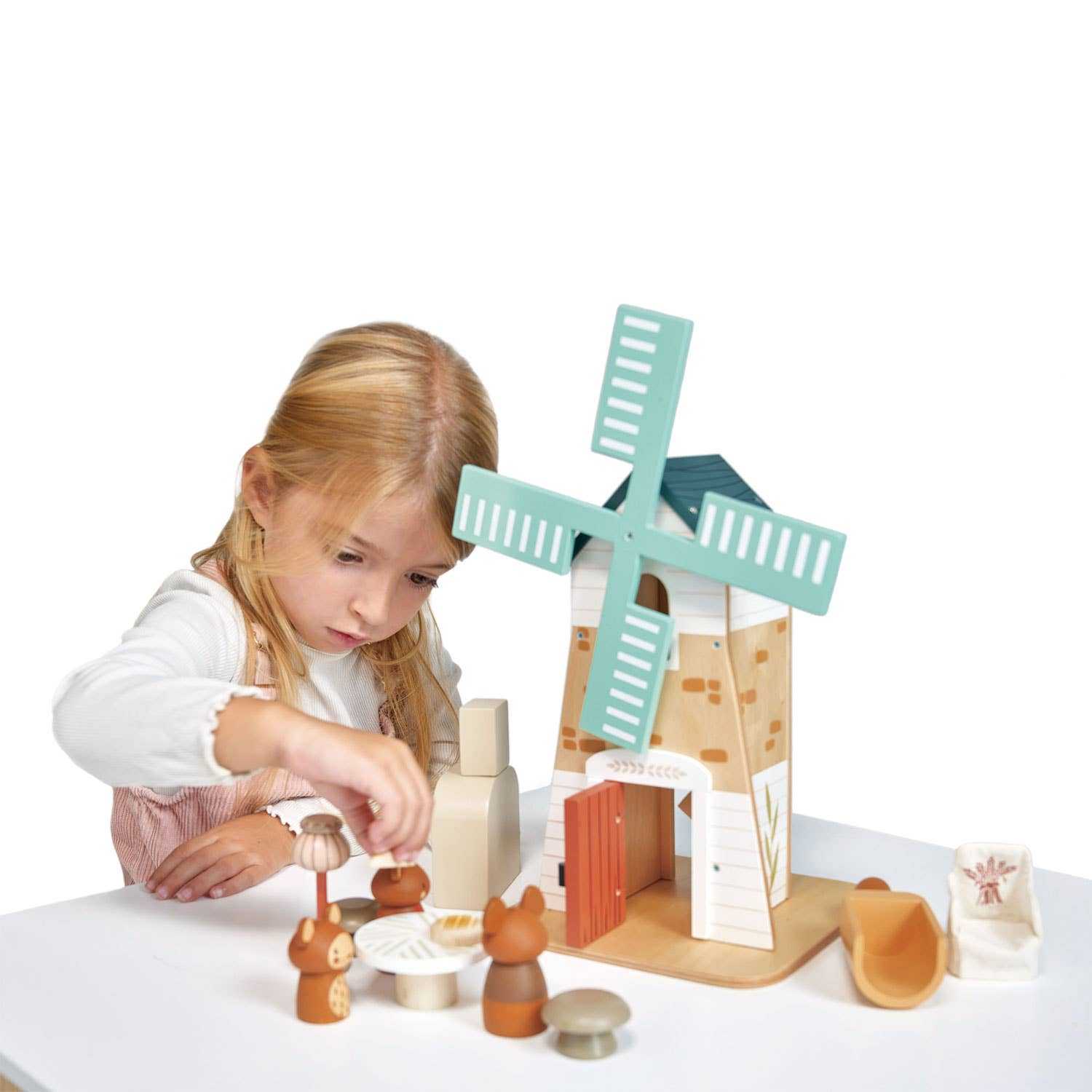 Child playing with Penny Windmill Character Play Set Wooden Toy, engaging with mouse figurines and accessories on a tabletop setup.