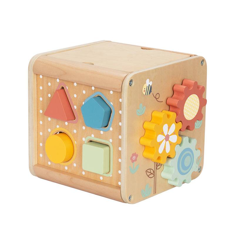 Side view of ThinkNest Wooden Activity Cube showing shape sorter and spinning gears to support toddler cognitive and motor skills.