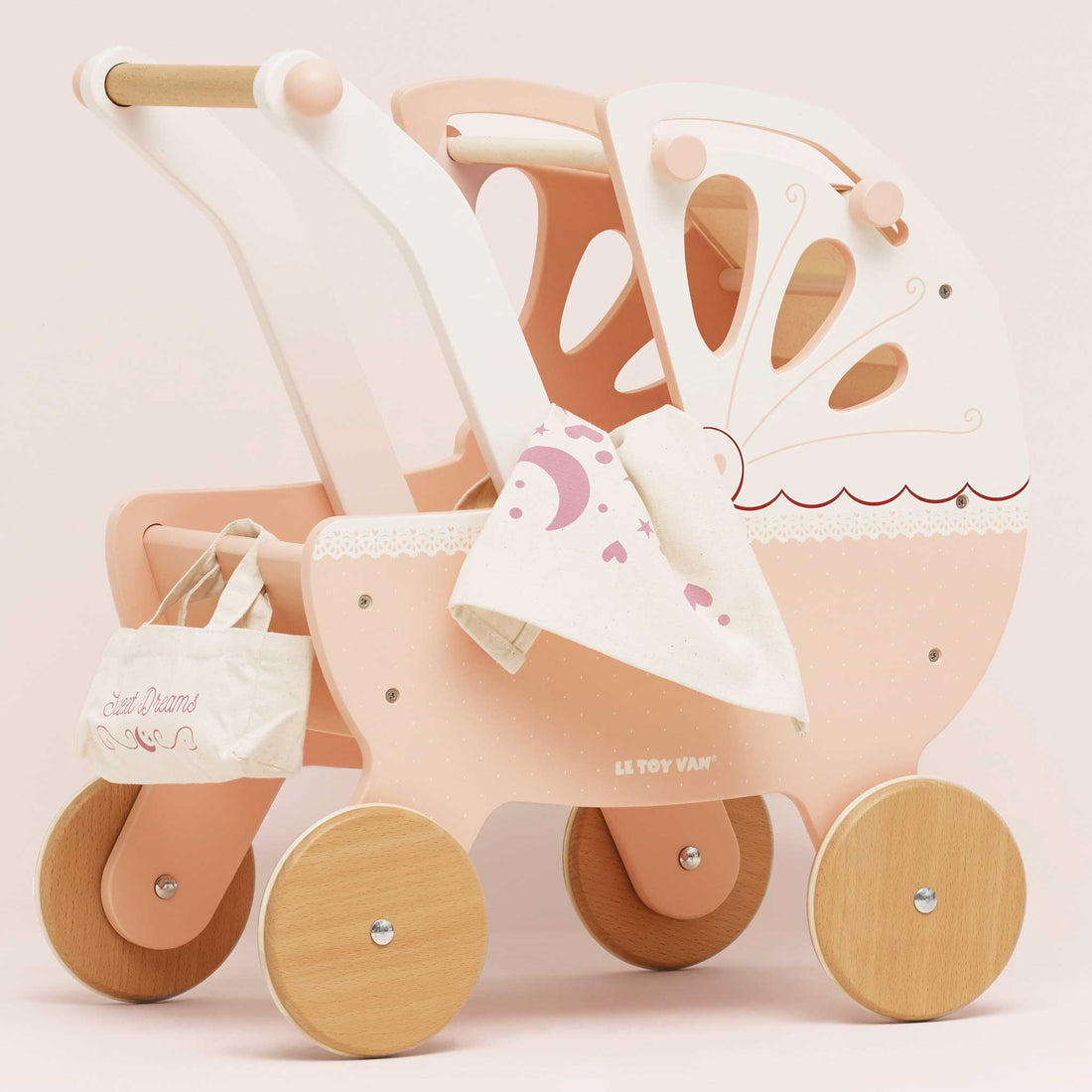 Ley Toy Van Retro Wooden Doll's Pram in pastel pink with butterfly design, wooden wheels, and included blanket and travel bag for ages 3+.
