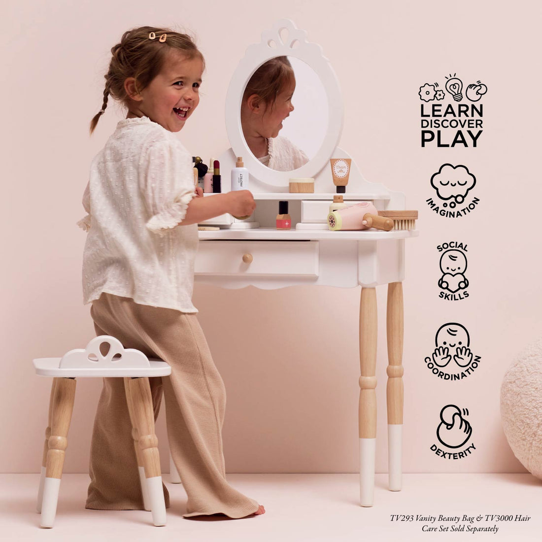 Le Toy Van child's vanity set with mirror, drawers, and stool in white and natural wood finish, ideal for toddler imaginative play.
