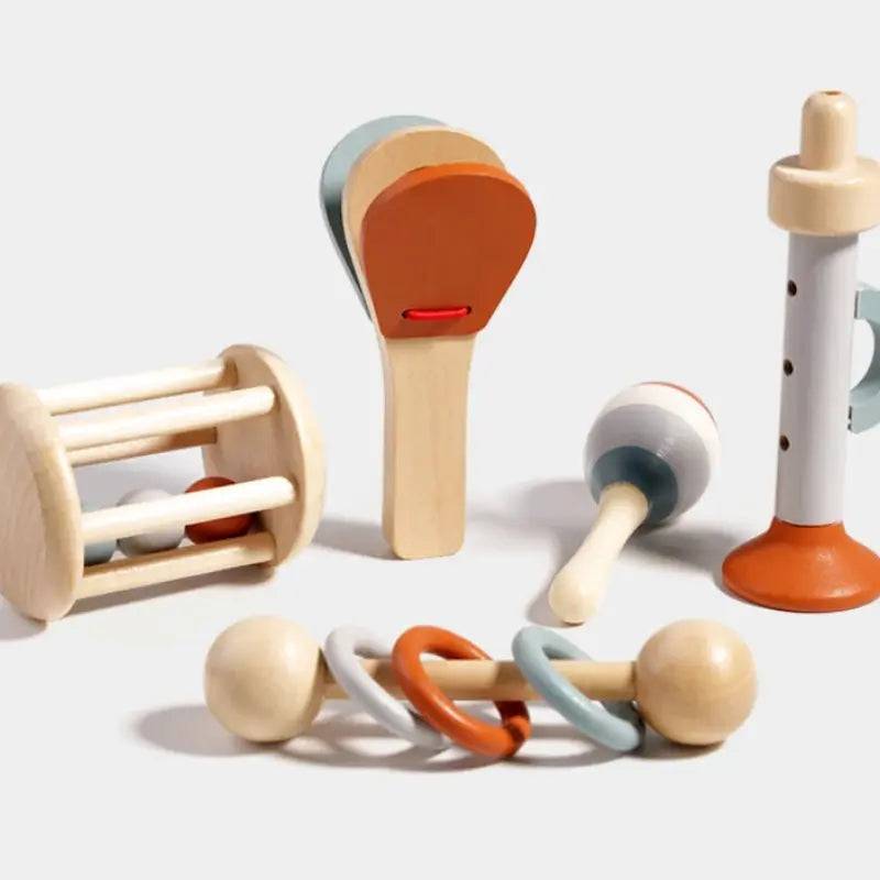 GrooveNest - Toy Instrument Set for Infants includes 5 wooden percussion toys in soft colors, ideal for sensory play and early music learning.