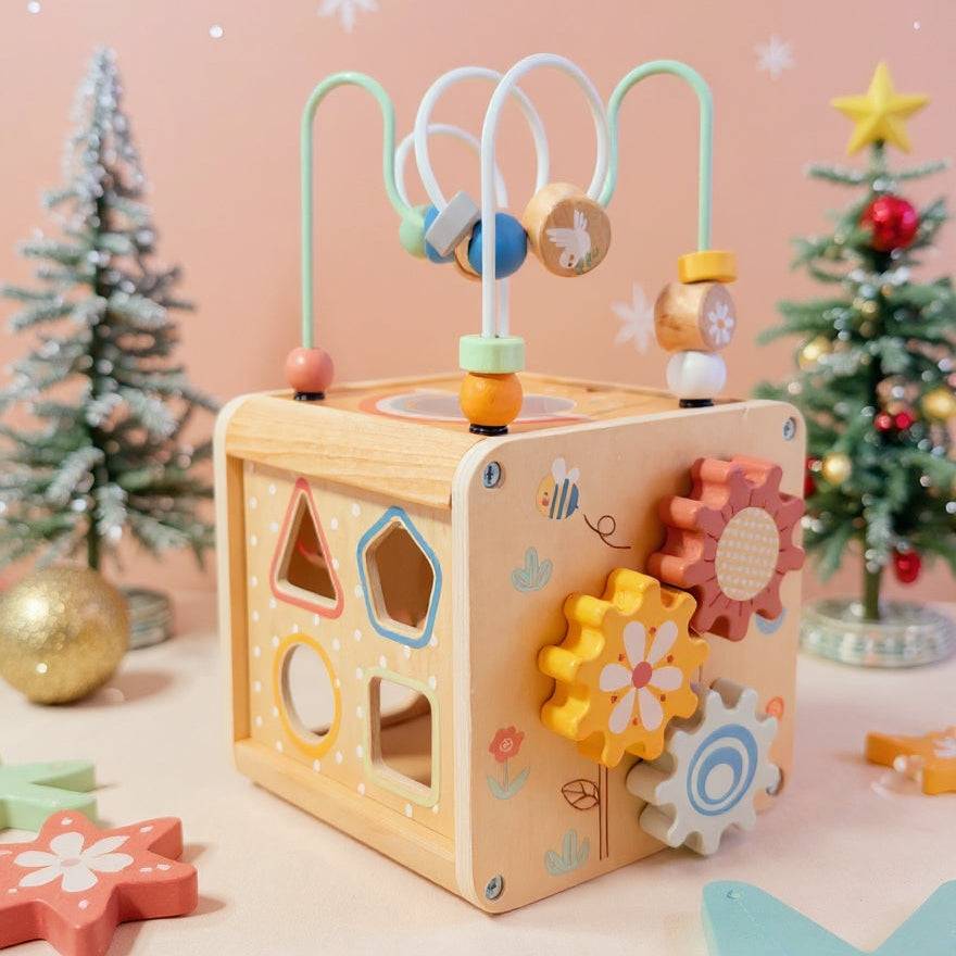ThinkNest - Wooden Activity Cube with bead maze and animal-themed sliders to enhance fine motor skills for toddlers 12+ months.