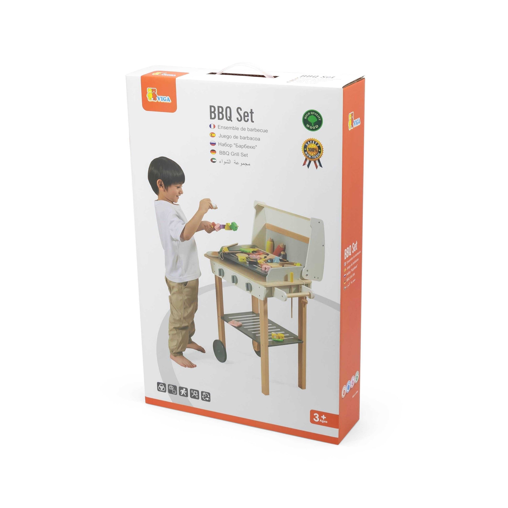 Front packaging of the wooden BBQ play set, featuring a child playing with the grill and showcasing the product's realistic design and accessories.