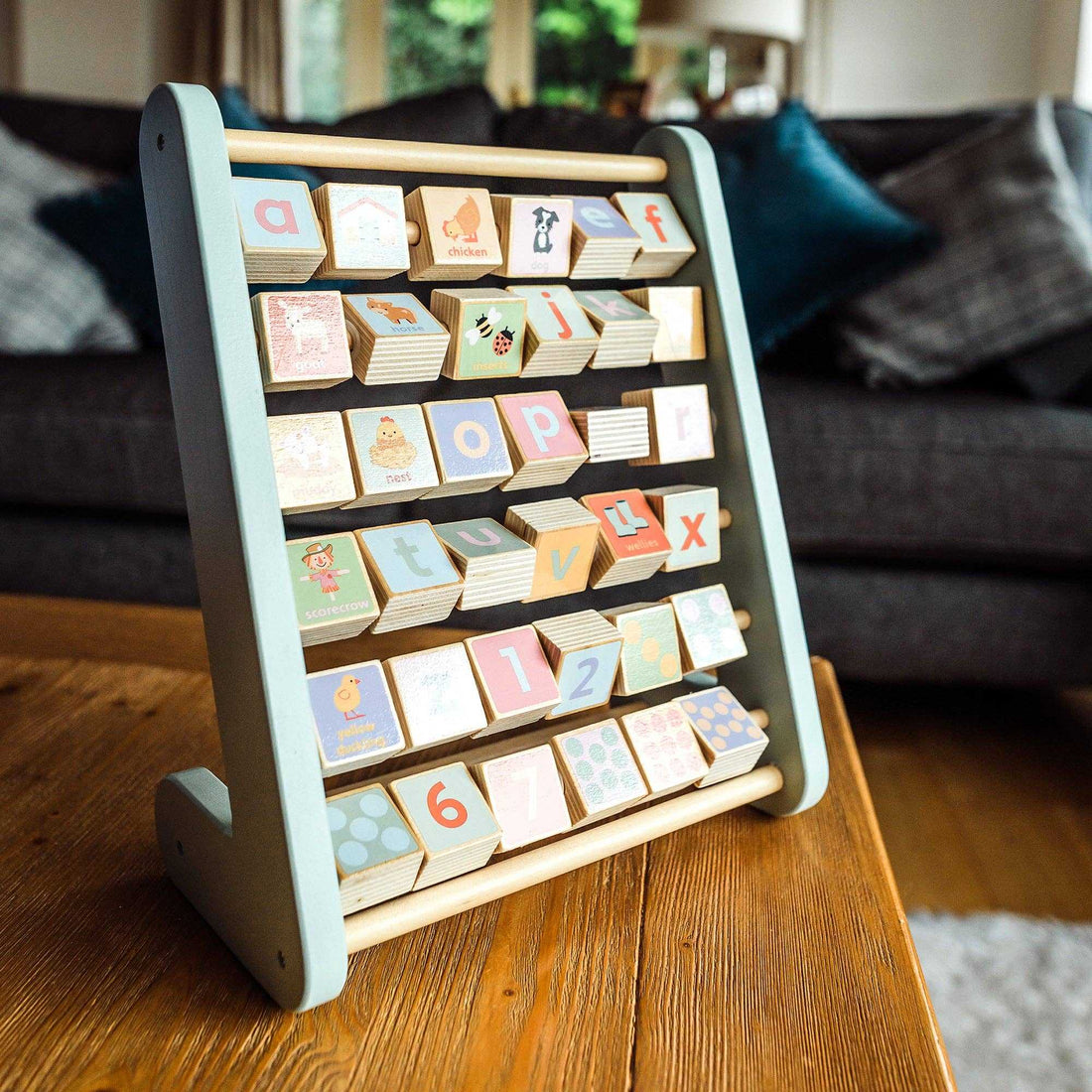 Farm Animal Alphabet Abacus - Wooden Learning Toy with colorful ABC blocks and numbers for interactive toddler education.