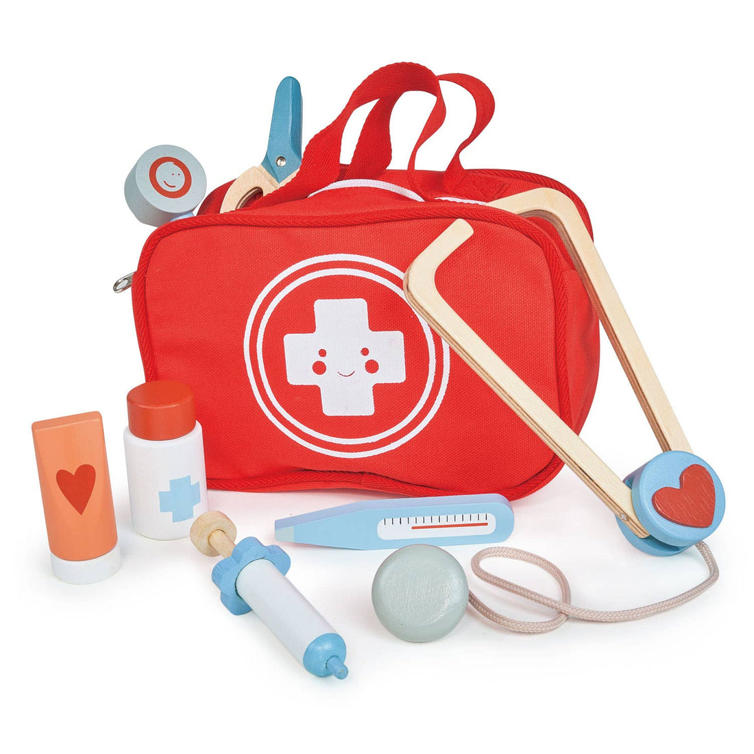 My First Aid Kit wooden role play toy featuring a red doctor's bag with a white cross and smiling face, along with wooden medical tools like a stethoscope, syringe, and thermometer. Ideal for pretend play for kids aged 3 and up.
